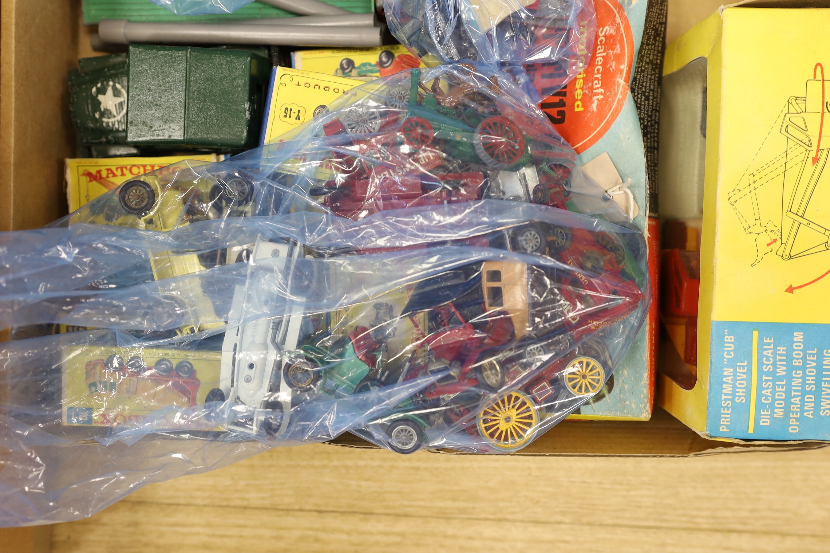 A collection of die-cast toys and boxed games